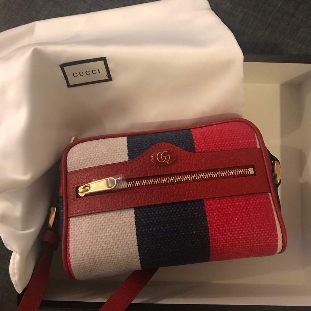 Guccis cross body bag